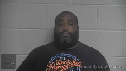 Mugshot of TRAVIS LEWIS booked in Oldham County, Kentucky on July 6, 2026