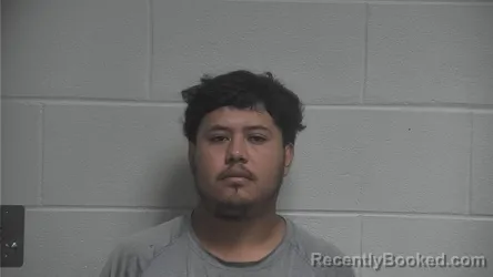Mugshot of ANGEL HINOJOSA-VAZQUEZ booked in Oldham County, Kentucky on July 8, 2026