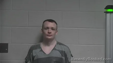 Mugshot of BENTON TAYLOR MOORE booked in Oldham County, Kentucky on July 8, 2026