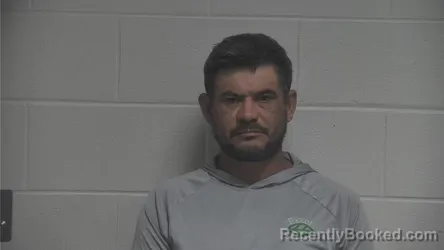 Mugshot of Alvaro Yobani Marroquin booked in Oldham County, Kentucky on August 17, 2026