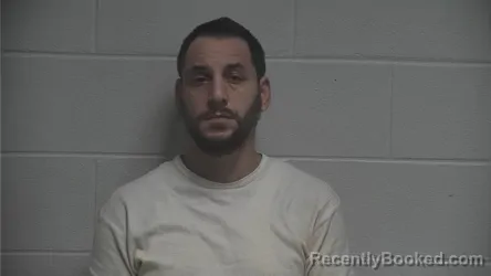 Mugshot of Fidan Donwon Osmani booked in Oldham County, Kentucky on August 18, 2026