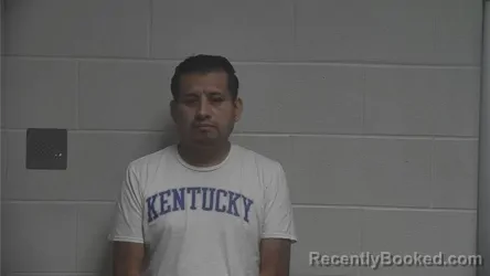 Mugshot of Juan Santiago-Santiago booked in Oldham County, Kentucky on August 19, 2026