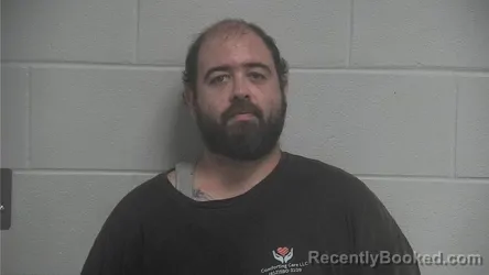 Mugshot of Claude Oscar Cunningham booked in Oldham County, Kentucky on August 20, 2026
