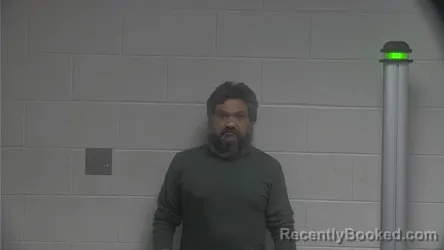 Mugshot of Hasamukhbhai Vishnubhai Patel booked in Oldham County, Kentucky on August 20, 2026