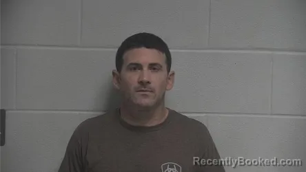Mugshot of Dusty Hamilton booked in Oldham County, Kentucky on August 26, 2026