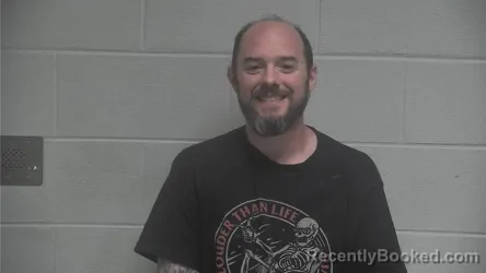 Mugshot of Michael Joseph Hughes booked in Oldham County, Kentucky on October 4, 2026