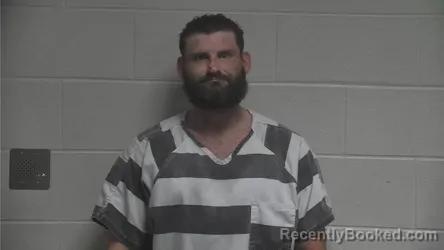Mugshot of Nicholas Scott Crisp booked in Oldham County, Kentucky on October 6, 2026
