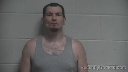 Mugshot of Corey Edward Glahn booked in Oldham County, Kentucky on October 9, 2026