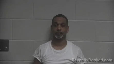 Mugshot of Dennis Anthony Booker booked in Oldham County, Kentucky on October 9, 2026