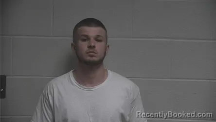 Mugshot of Carter Wade Onan booked in Oldham County, Kentucky on October 12, 2026