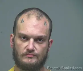 Mugshot of Devin Andrew Brown booked in Perry County, Kentucky on September 30, 2026