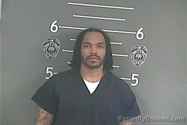 Mugshot of BRANDON . HOLLAND