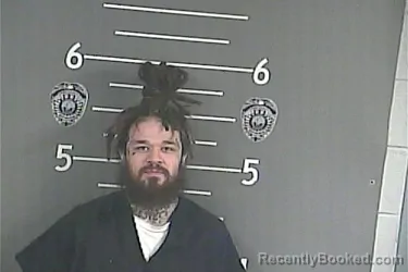 Mugshot of DAVID . SNEED