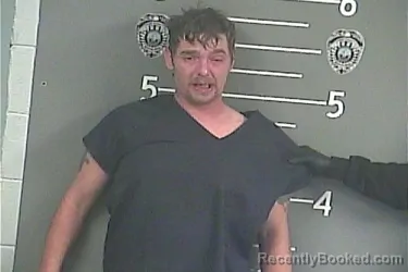 Mugshot of GEORGE K MAXWELL