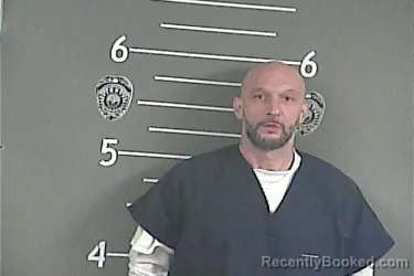 Mugshot of JOSHUA . HENDERSON