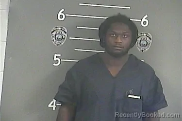 Mugshot of OSAGYEFO NKRUMAH NAGBE booked in Pike County, Kentucky on July 6, 2026