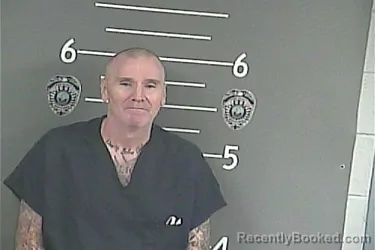 Mugshot of ROYCE E SNOW