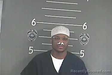 Mugshot of TRENTON D HODGE