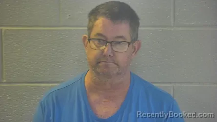 Mugshot of MICHAEL DAVID PHELPS