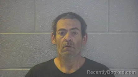 Mugshot of TRAVIS W ADAMS