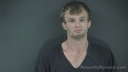 Mugshot of LOGAN BAKER booked in Russell County, Kentucky on July 7, 2026