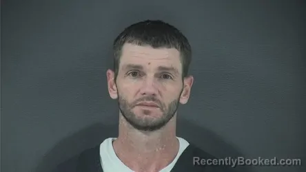 Mugshot of TRAVIS RAY ROBERTSON booked in Russell County, Kentucky on May 13, 2026