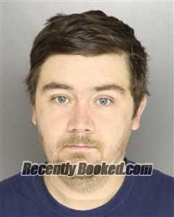 Mugshot of John Wyatt Chisholm booked in Moore County, North Carolina on September 11, 2026