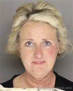 Mugshot of HOLLY MICHELLE ROGERS booked in Moore County, North Carolina on March 18, 2026