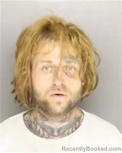 Mugshot of MATTHEW PHILLIP RIVENBARK booked in Moore County, North Carolina on March 20, 2026