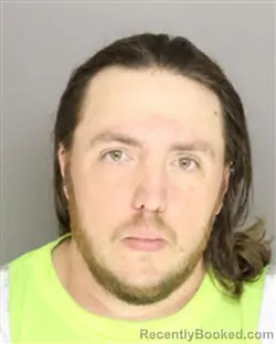 Mugshot of CODY BRIAN WOODARD booked in Moore County, North Carolina on March 25, 2026