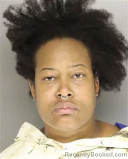 Mugshot of YASMEEN LATIFA DEAN booked in Moore County, North Carolina on July 6, 2026