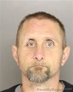 Mugshot of SHANNON RAY CAVINESS