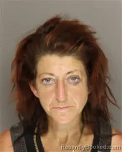 Mugshot of Merrin Curtis Lowe booked in Moore County, North Carolina on September 9, 2026