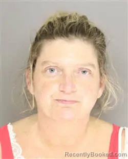 Mugshot of Elizabeth Ann Burgess booked in Moore County, North Carolina on August 19, 2026