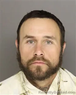 Mugshot of DANIEL REESE RUSSELL