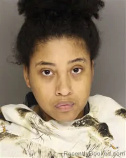 Mugshot of DANELA NINA AUSBY booked in Moore County, North Carolina on March 4, 2026