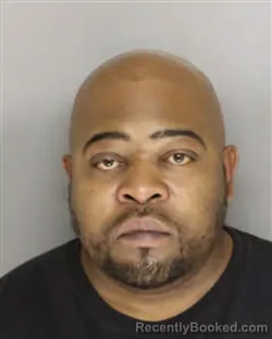 Mugshot of KENNY JERMAINE MARTIN booked in Moore County, North Carolina on March 19, 2026