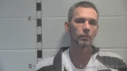 Mugshot of TRAVIS E SMITH