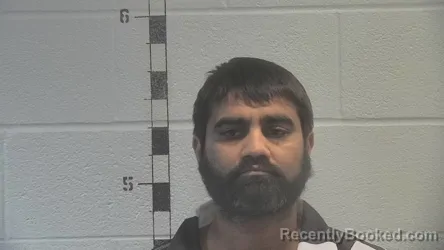 Mugshot of Devangbhai Ashokvhai Patel booked in Shelby County, Kentucky on August 6, 2026