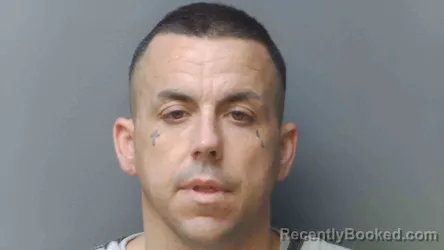 Mugshot of RAYMOND HENLEY