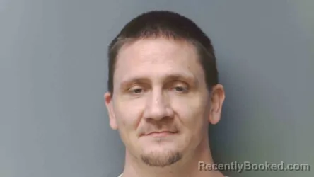 Mugshot of JUSTIN SMITH