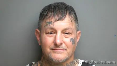 Mugshot of MICHAEL ANOMAN