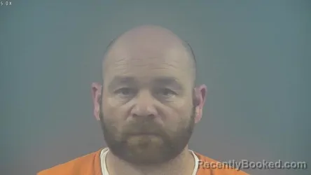 Mugshot of AARON BRUCE CUMMINS booked in Warren County, Kentucky on March 25, 2026