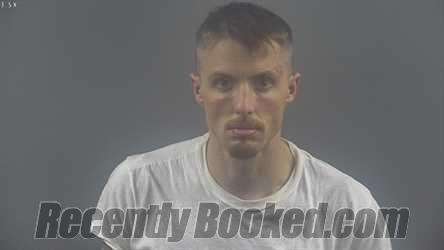 Booking photo from Warren County, Kentucky