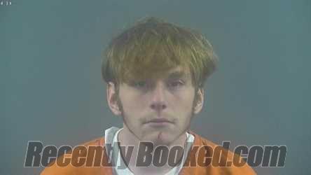 Booking photo from Warren County, Kentucky