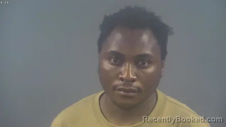 Mugshot of ASENDE MOHAMED booked in Warren County, Kentucky on June 26, 2026