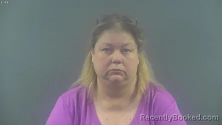 Mugshot of ANGELA SANDERS YORK booked in Warren County, Kentucky on April 7, 2026