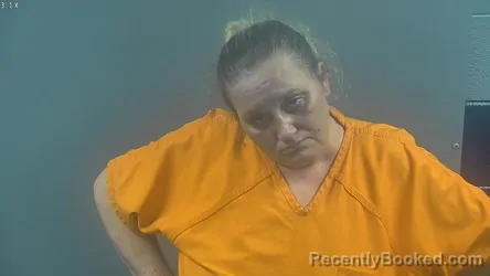 Mugshot of Carrie Lanaie Jensen booked in Warren County, Kentucky on September 9, 2026