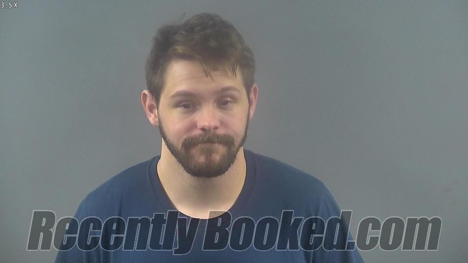 Booking photo from Warren County, Kentucky