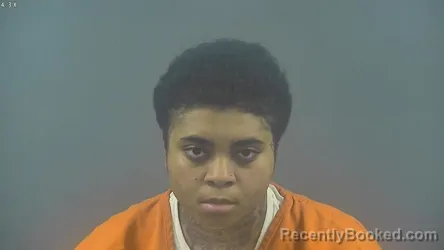 Mugshot of DANIELLE MARIA MENSAH booked in Warren County, Kentucky on June 2, 2026
